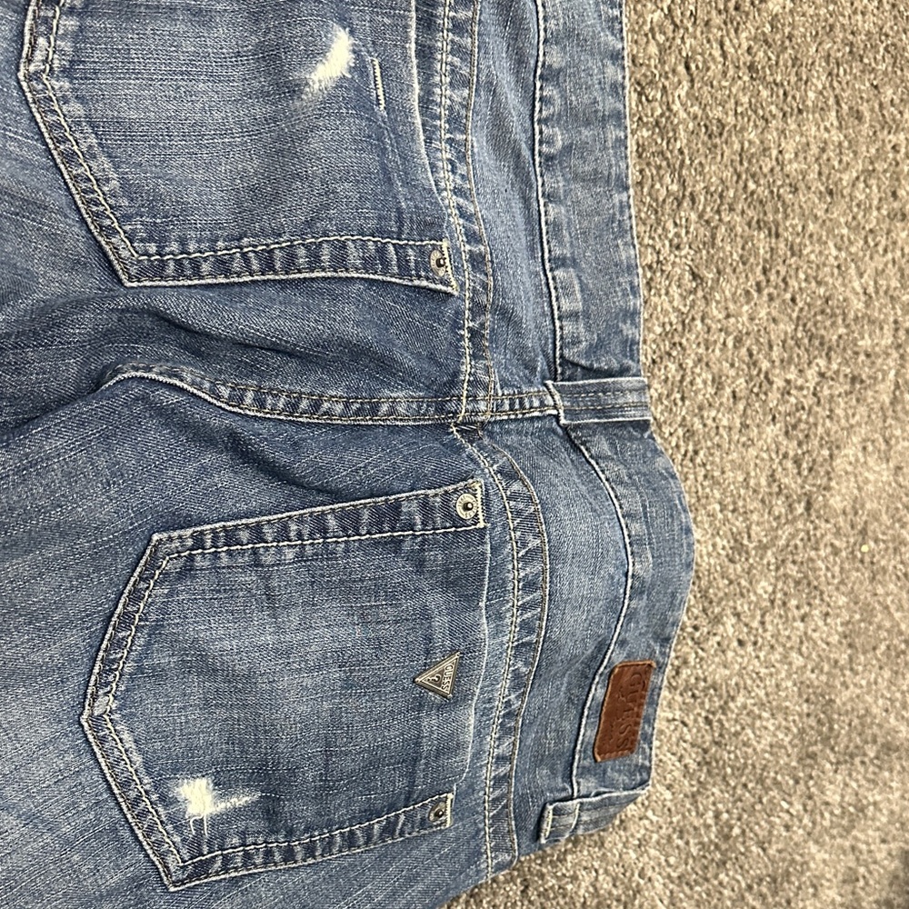 Guess Light Blue Distressed Denim Jeans with Triangle Logo